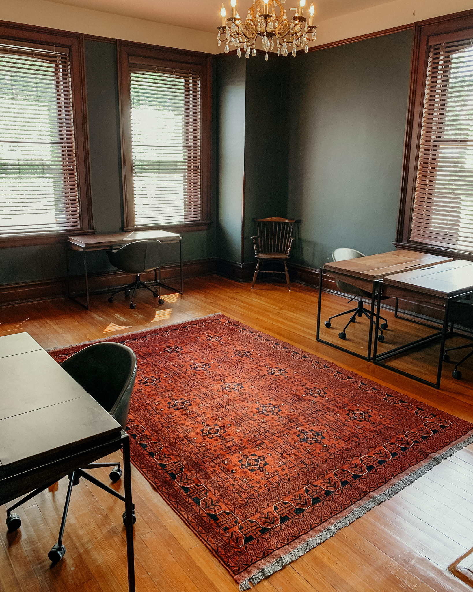 Empty office room with a rug and chairs